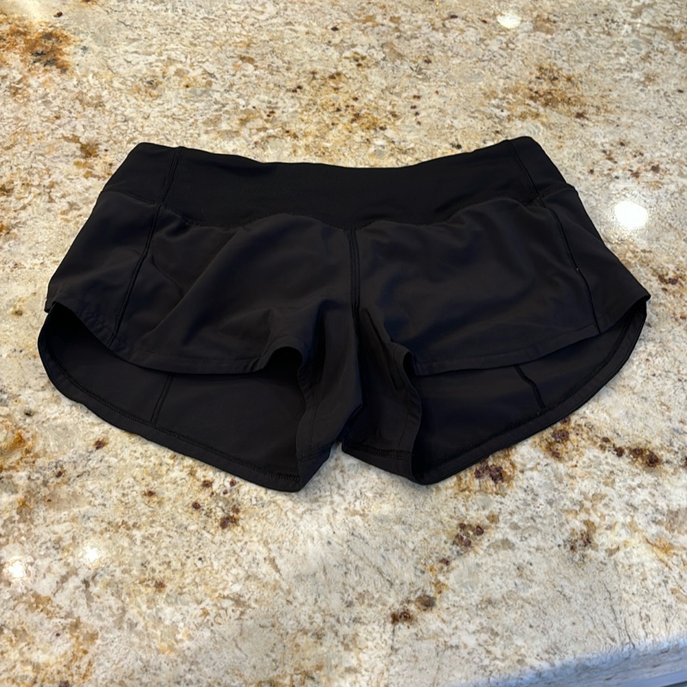 Lululemon speedups black 2.5 inch size 4
